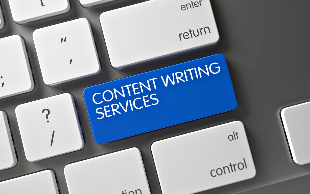 Blue key with text 'Content Writing Services' on a keyboard