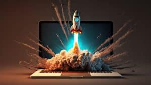 Rocket launching from laptop screen, symbolizing tech innovation