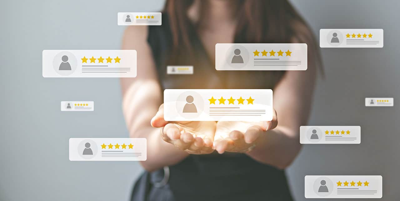 Five-star online reviews concept with digital icons floating in air