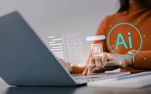 Woman using AI tools on laptop in modern workspace