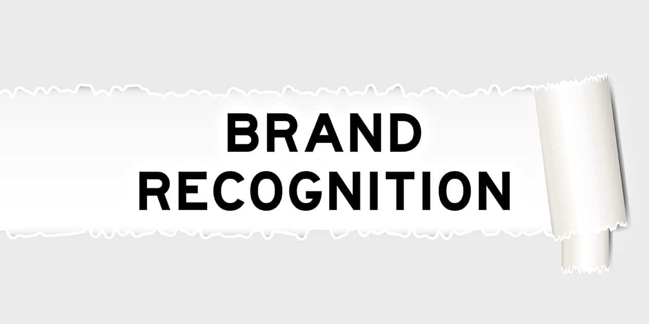 Brand recognition text on torn paper background