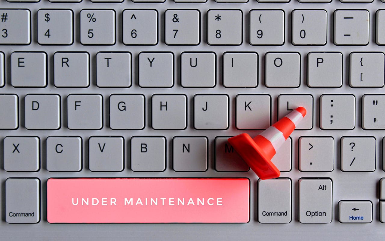 Keyboard with maintenance alert and traffic cone