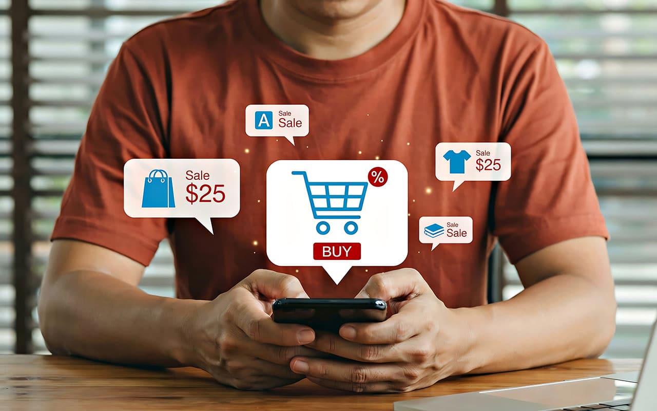 Person shopping online via mobile with discount notifications and shopping cart icon